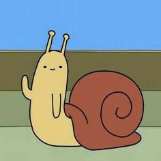 a snail is sitting on the ground with its eyes closed