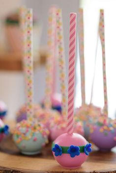 some cake pops are sitting on a table