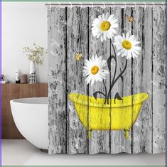 a shower curtain with daisies in a yellow bathtub on a wooden plank background