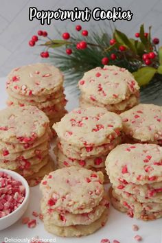 peppermint cookies with sprinkles and a bowl of candy caned