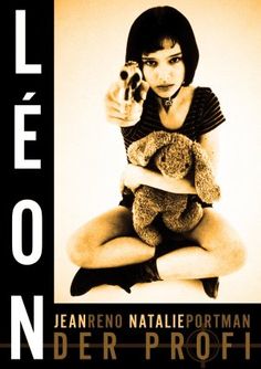 a woman sitting on the ground holding a teddy bear in her hands and pointing at something