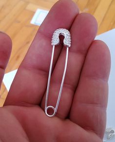 "2 Solid Sterling Silver 925 Safety Pin bail Nappy Pin Diaper charms clasp brooch with Pave clear CZ sold by pairs size: 50 mm x 11 mm x 6 mm (2 inches x 1/2 inches x 1/4 inches)  Note: We have many safety pins with or without CZ. search for \"safety\" word in to find other safety pins    Description: 2 Solid Sterling Silver 925 Safety Pin bail Nappy Pin Diaper charms clasp brooch with Pave clear CZ. this safety pin pave in both faces, that is perfectly symetrical," Silver Safety Pin Shaped Brooch, Silver Cubic Zirconia Jewelry With Brooch, Pin Charms, Safety Pins, Safety Pin, Sterling Silber, Silver 925, Diamond Jewelry, Charms