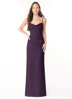 a woman in a long purple dress