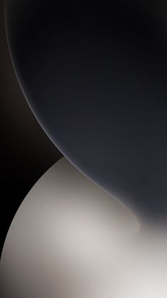 an abstract image of white and black shapes