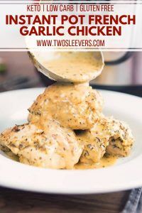 chicken with gravy being poured onto it in a white bowl on top of a wooden table