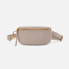 taupe fern belt bag on a white background. Bow Jewelry, Shoe Boot Sandals, Adjustable Belt, Leather Hobo, Brass Hardware, Clutch Wallet, Belt Bag, Pebbled Leather, Fern