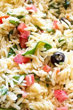 a close up view of some rice and vegetables