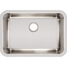 an image of a stainless steel sink with a round hole in the center and bottom