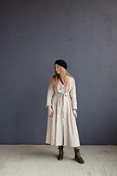 Long coat is made from 100% soft and washed medium weight linen. Details: - Composition: 100% Oeko-Tex certified linen - A shaped - Colour: natural - Linen belt - 3 linen buttons - Size: XS, S, M, L, XL, XXL - Medium weight linen - Linen care: machine wash gentle; tumble dry low, ironing optional - The price is for one coat, other pictured items are not included Winter Linen Solid Color Outerwear, Winter Solid Linen Outerwear, Winter Linen Outerwear In Solid Color, Solid Linen Winter Outerwear, Long Linen Outerwear For Winter, Relaxed Fit Long Linen Outerwear, Oversized Linen Outerwear For Work, Oversized Linen Long Coat, Oversized Beige Linen Outerwear