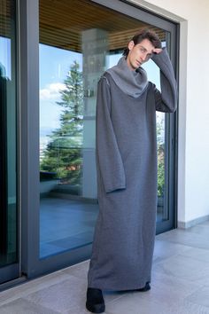 Our extra long winter dress form men is warm, comfy and different - the absolute MUST HAVE men robe dress. Cut from fluffy sweatshirt winter cotton, with two side pockets and big high neck.  Gender fluidity in style is no longer a thing for only women, but men too. CherryBlossomsDress thinks that men should embrace the trend too and rock a few pieces 'borrowed from the girls'. Our spring summer collection for men presents dresses, caftans, dress shirts, tunics, maxi dresses and skirts for men. W Winter Dressing For Men, Men Cyberpunk, Long Winter Dresses, Fluffy Sweatshirt, Gender Fluidity, Men Kaftan, Cyberpunk Clothing, Cyberpunk Clothes, Gender Neutral Clothes