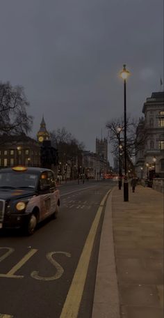 a police car is driving down the street