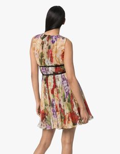 Elevate your style with Dolce & Gabbana's Floral-Print Chiffon Mini Dress. Featuring a multicolor silk design, this sleeveless dress boasts round neck and flared design for flattering silhouette. Let confidence blossom its finished hem. Perfect any occasion. Floral Print Chiffon Dress, Silk Design, Print Chiffon Dress, Chiffon Mini Dress, Floral Print Chiffon, Floral Chiffon, Print Chiffon, Printed Mini Dress, Silk Chiffon