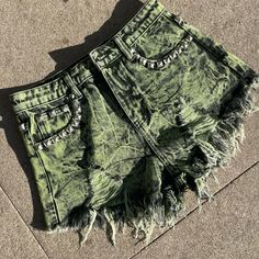 Current Mood Distressed Green High Waisted Shorts - Worn Once For A Music Video High Waist Bottoms With Frayed Hem For Festival, Trendy Festival Bottoms With Frayed Hem, Trendy Bottoms With Frayed Hem For Festival, Trendy High Waist Bottoms For Festivals, Frayed Hem Festival Shorts, Distressed Bottoms For Spring Festival, Festival Shorts With Frayed Hem, Distressed Cutoff Bottoms For Festival, Festival Distressed Short Bottoms