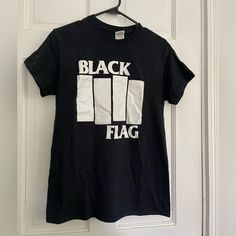 Black Flag Band T Shirt, Never Worn ..Gildan Heavyweight T Shirt Men’s Size Small Black Band Merch Tops With Letter Print, Black Band Merch Top With Letter Print, Black Letter Print Top Band Merch, Black Cotton T-shirt For Fan Merchandise, Black Cotton Graphic Tee Shirt, Black Cotton Shirt With Graphic Design, Black Graphic Tee Shirt With Screen Print, Black Cotton Shirt With Letter Print, Black Band Merch Shirt With Text Print