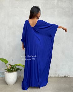 DETAIL * Bust/ Waist/ Hips 34 in (Circumference 68 in.) * Arms 11 in. (Circumference 22 in.) * Length 50 in. & 55 in. * V-Neck * Side slits * No pocket * Slipover style * All above measurement are flat FABRIC * 100% Rayon Voile FIT * One size fit most up to size US 4XL * Hangs loose and away from the body * Length can be versatile as a knee length, mid calf length, ankle length and floor length depending on your style MODEL * Height 5 ft. 4 in. / 163 cm. * With or without 4 in. High Heels Th Fitted Blue Kaftan For The Beach, Blue Fitted Kaftan For Beach, Blue Free Size Long Maxi Dress, Fitted Floor-length Kaftan For The Beach, Traditional Blue Flowy Maxi Dress, Flowy Blue Traditional Maxi Dress, Traditional Flowy Blue Maxi Dress, Blue Long Free Size Kaftan, Blue Fitted Long Kaftan