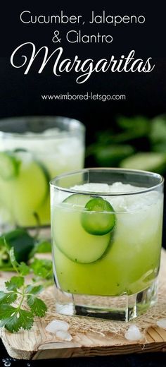 cucumber, jalapeno and cilantro margaritas in glasses on a cutting board