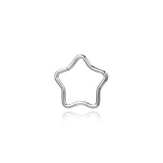 a silver star shaped ring on a white background