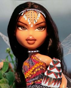 a close up of a doll with long black hair wearing a dress and headpiece