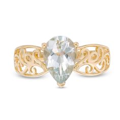 She'll be proud to wear this ravishing gemstone ring. Crafted in warm 10K gold, this unforgettable design showcases a 10.0 x 7.0mm pear-shaped icy-blue aquamarine solitaire centered on a sculpted filigree-detailed shank. Buffed to a brilliant luster, this ring is a fabulous choice she won't be able to resist. Elegant Yellow Gold Pear-shaped Topaz Ring, Elegant Pear-shaped Yellow Gold Topaz Ring, Elegant Pear-shaped Topaz Ring For Gift, Elegant Pear Shaped Topaz Ring, Elegant Pear-shaped Topaz Ring For Formal Events, Elegant Pear Shaped Topaz Ring For Formal Occasions, Elegant Pear-shaped Gemstone Birthstone Ring, Elegant Teardrop Topaz Gemstone Ring, Elegant Teardrop Topaz Ring