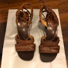 Brand New Sandals With Duster Bag. Great Chocolate Color In High Quality Leather. Braided Leather Laces Wrap Around The Leg. I Wear A Size 8.5 And The Size 40 1/2 Fit Me Perfectly. Formal Woven Leather Heels With Ankle Strap, Formal Ankle Strap Woven Leather Heels, Leather Open Toe Heels With Intrecciato Weave, Woven Leather Wedge Heels, Brown Heels With Woven Sole And Ankle Strap, Leather Heels With Intrecciato Weave And Open Heel, Formal High Heel Woven Leather Sandals, Formal Open Toe Woven Leather Sandals, Formal Open Toe Heels With Intrecciato Weave