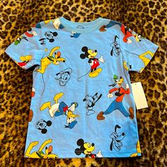 Size: 5 New With Tags Mickey Mouse Tops For Disney Trips In Summer, Mickey Mouse Shirt For Disney Fan Events In Summer, Casual Tops With Character Print For Playtime, Disney Summer Shirt For Disney Trips, Fun Mickey Mouse Shirt For Disney Trips, Playful Mickey Mouse Tops For Summer, Playful Summer Tops With Mickey Mouse, Disney Character Print Summer Shirt, Disney Cartoon Print Summer Shirt