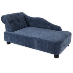 a blue chaise lounge chair with studded legs