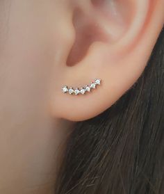 TINY CZ SILVER CURVED BAR CLIMBER STUD EARRINGS - Pair of studsPave earring with 7 sparkly cubic zirconia diamonds - 18 gauge.• The studs come with silicon backs• Available also in 14K GOLD FILLED, STERLING SILVER AND 14K ROSE GOLD FILLED°°°°°°°°°°°°°°• Nickel Free• Tarnish Resistant• No Allergic reaction• 30 days return policy • Accept replacements and custom orders°°°°°°°°°°°°°°• We ship all items in a jewelry gift box• Greeting card - upon request°°°°°°°°°°°°°°Shipping information :• Tracking Minimalist Silver Ear Climbers For Anniversary, Silver Prong Set Ear Climbers For Anniversary, Silver Ear Climbers With Prong Setting As Gift, Elegant Tiny Silver Ear Cuff, Silver Sterling Silver Ear Climbers, Tiny Sterling Silver Ear Climbers, Diamond Climber Earrings, Tiny Gold Studs, Curved Bar