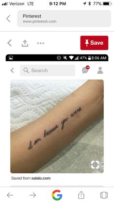 a person with a tattoo on their arm that reads, i am because you were