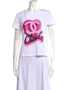 Chanel T-ShirtFrom the 2023 Collection by Virginie ViardWhiteInterlocking CC LogoShort Sleeve with Crew NeckDesigner Fit: Designed for a tailored fit, recommend taking one size up. Chanel T Shirt, 2023 Graphic, Chanel 2023, Chanel Shirt, Pink Chanel, 2023 Collection, Accessories Jacket, Outerwear Sweater, Shirt Accessories