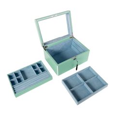 an open jewelry box with four compartments