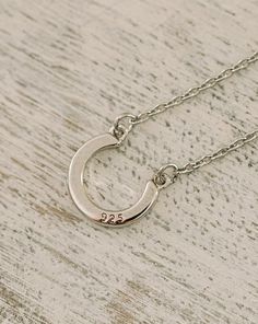 Classy and beautiful! This quality, modern, minimalistic necklace is a favorite amongst equestrians! Available in 14k gold plated, 925 sterling silver or rose gold 1/4 " simple horseshoe charm and chain 18" long It is perfect to layer with additional necklaces From our barn to yours! Lots of good luck is coming your way! 100% of profits go to the Bridle Up Hope charity! xoxo Horseshoe-shaped Jewelry With Adjustable Chain, Horseshoe Shaped Sterling Silver Necklaces, Classic Horseshoe Jewelry As A Gift, Classic Horseshoe-shaped Sterling Silver Jewelry, Silver Sterling Silver Horseshoe Necklace, Classic Sterling Silver Horseshoe Jewelry, Elegant Sterling Silver Horseshoe Jewelry, Horseshoe-shaped Jewelry With Adjustable Chain For Gifts, Sterling Silver Horseshoe Necklace For Gifts