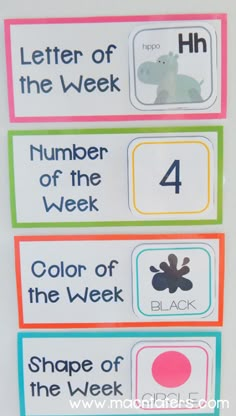 four colorful labels with numbers and animals on them for the classroom to use in their writing