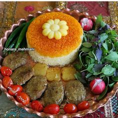 a plate filled with meat and vegetables on top of a table next to other foods