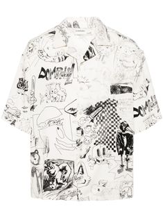 a white shirt with black and white pictures on it