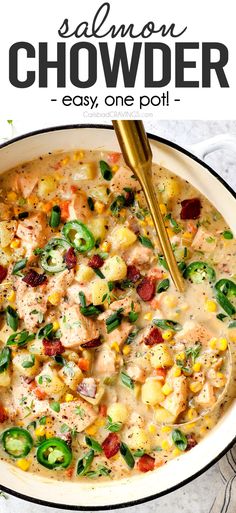 salmon chowder with potatoes, corn and green peppers in a white bowl on a marble surface