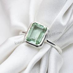 Unique Green Amethyst Ring, Prasiolite Ring, Birthstone Ring Boho Gemstone Ring, 925 Sterling Silver, Women Wedding Anniversary Ring, Handmade Jewelry Her, February Birthstone Gift, Her , Mom, Cocktail Ring, Amethyst Ring, Engagement Ring,  Mattel : - 925 sterling silver/ Gold Fill Gemstone :-  Prasiolite Stone Shape :  Cushion Faceted Stone color : Green Stone Size : 7 x 9 mm ring size : all size rings available This One of a kind ring is adorned with beautiful Purple Amethyst Gemstone in sterling silver.Amethyst is the birthstone representing the month of February. About gemstone-.Amethyst is linked to the element of wind.It is believed to prevent intoxication.This purple gemstone is associated with Royalty.This stone has amazing healing power and very helpful in purifying the mind and r Silver Stackable Rings With Emerald-cut Gemstone, Silver Emerald Cut Gemstone Stackable Rings, Rectangular Amethyst Ring For Gift, Green Amethyst Sterling Silver Ring Gift, Silver Green Amethyst Rings As Gifts, Silver Green Amethyst Rings For Gift, Silver Rings With Green Amethyst For Gift, Sterling Silver Rings With Rectangular Birthstone, Green Amethyst Gemstones With Accent Stones For Gift