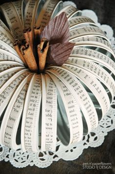 an ornament made out of old music sheets