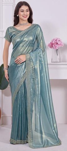 Blue color Saree in Shimmer fabric with Zircon work Formal Blue Art Silk Saree, Elegant Light Blue Saree With Zari Work, Elegant Light Blue Saree With Cutdana, Blue Floor-length Saree For Wedding, Elegant Blue Dupatta For Wedding, Elegant Blue Lehenga With Zari Weaving, Elegant Blue Saree For Wedding, Festive Light Blue Wedding Saree, Light Blue Art Silk Saree For Wedding