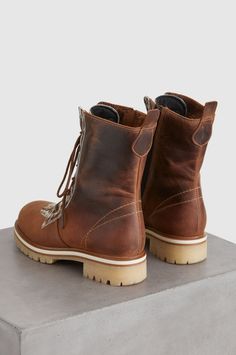 Women’s Lisette Wool-Lined Leather and Cowhide Boots | Overland Fall Outdoor Boots With Waxed Finish, Waxed Finish Boots For Outdoor Fall Activities, Waxed Finish Outdoor Boots For Fall, Leather Lace-up Boots For Fall Adventure, Oiled Leather Moto Boots With Round Toe For Outdoor, Rustic Leather Waterproof Boots For Fall, Leather Lace-up Boots For Adventure In Fall, Fall Adventure Leather Lace-up Boots, Rustic Work Boots With Leather Footbed For Outdoor