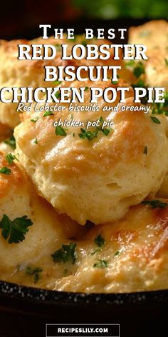 the best red lobster biscuit chicken pot pie is shown in a skillet with parsley on top