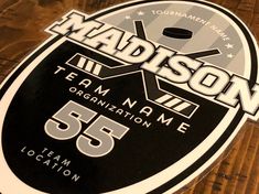 a sticker that says madison team name on it