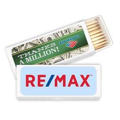 a box of matches with the words re / max on it and a pack of $ 100 bills