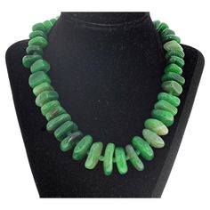 The largest of these magnificent rare green Agates is approximately 26mm x 23mm set in this fascinating 17 1/2 inch long necklace. The little green spacers are approximately 5mm. The clasp is a silver easy to use hook clasp. I admit that this is really beautifully elegant around your neck. Handmade Ceramic Jewelry, Sports Jewelry, Artisan Bracelets, Vintage Beads Necklace, Green Agate, Hook Clasp, Ceramic Jewelry, Beaded Necklaces, Long Necklace