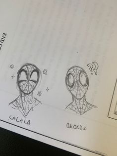 two drawings of spider - man's faces on top of a sheet of paper