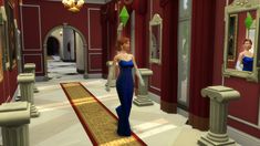 a woman in a blue dress walking down a hall way with red walls and columns