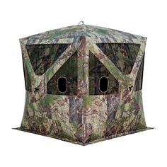 an image of a hunting blind with two holes in the front and one window open