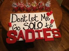 a sign that says don't let me go solo to saddes on it