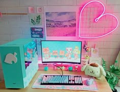 a desktop computer sitting on top of a wooden desk next to a keyboard and mouse