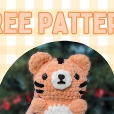 a hand holding a small teddy bear with the words free pattern below it and an orange background