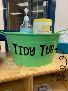 a tub that has some cleaning products in it and is labeled tidy tub 2x example